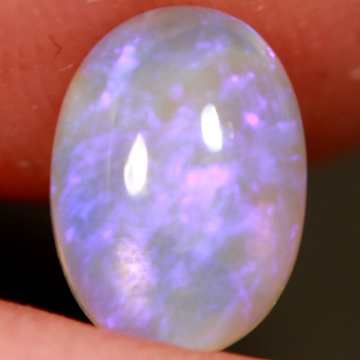 SOLID CRYSTAL OPAL Transparent with rich purple throughout
